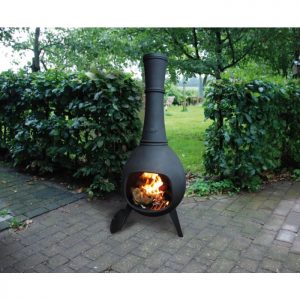 a cast iron chiminea on a patio