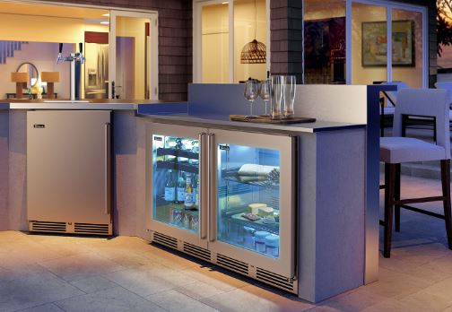 Dual outdoor refrigerators in outdoor kitchen with front grille vents