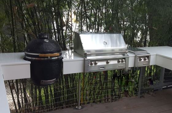 outdoor kitchen with white glass countertop