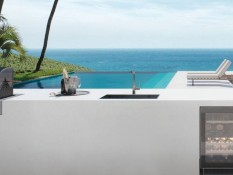 modern outdoor kitchen ideas in white next to pool