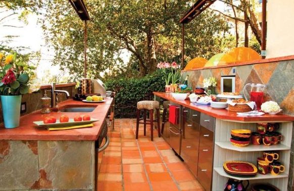 colorful slate tile kitchen with concrete countertops
