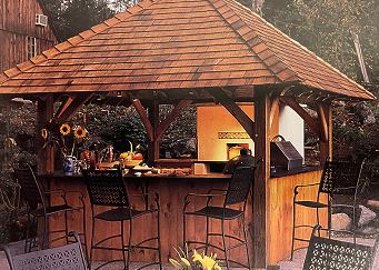 covered outdoor kitchen with rustic style and natural wood and stucco finishes