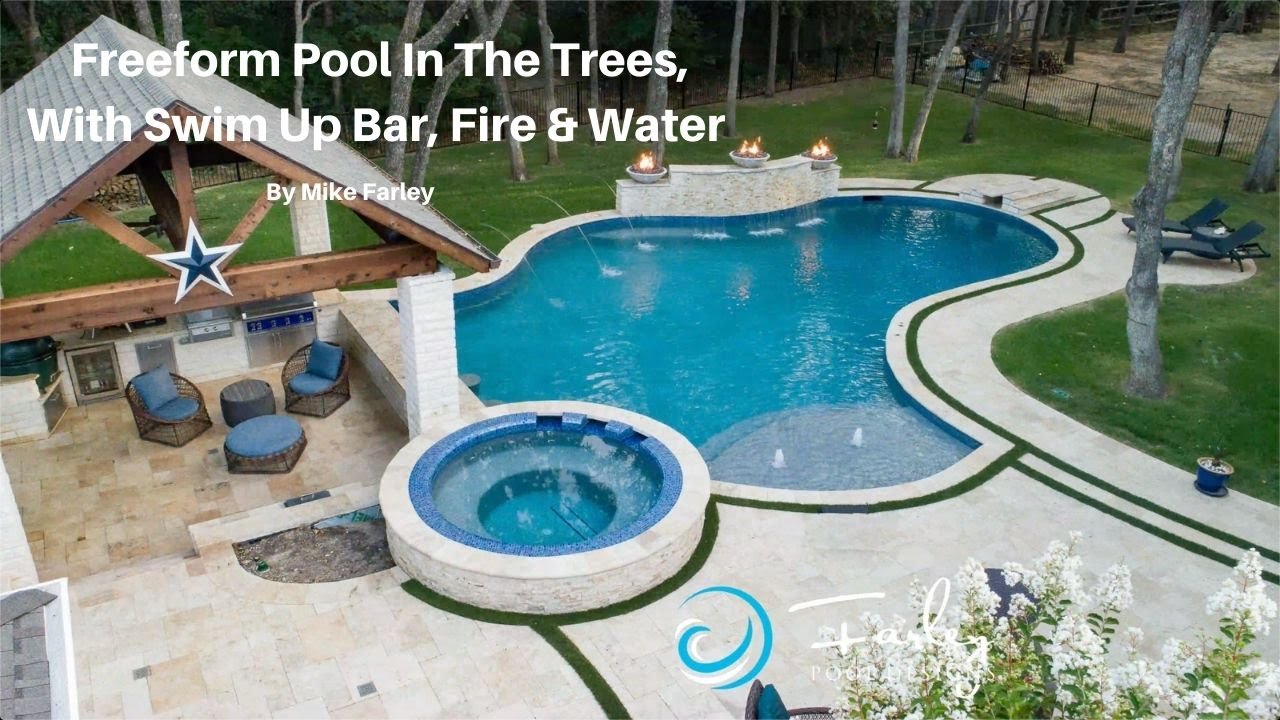 Freeform Pool in the Trees with Swim Up Bar, Fire & Water