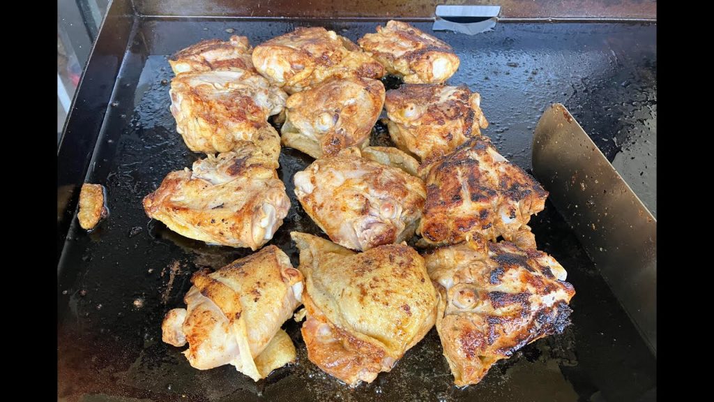 my-blackstone-griddle-grills-a-bunch-of-chicken-thighs-cook-drink