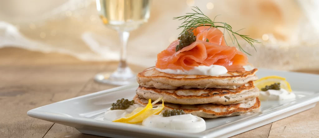 blinis stacked on a plate