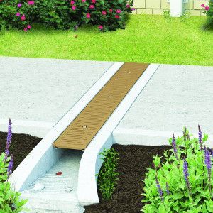 9 Clever & Decorative Patio Downspout Drainage Ideas